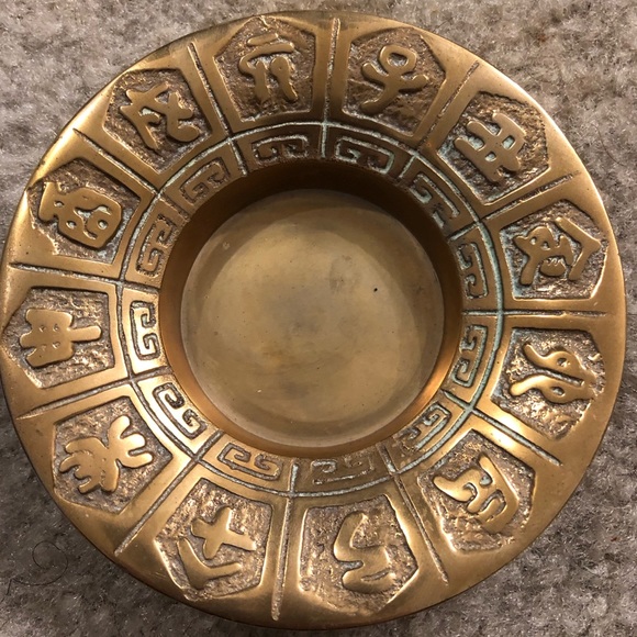 Vintage brass catchall or votive candle holder